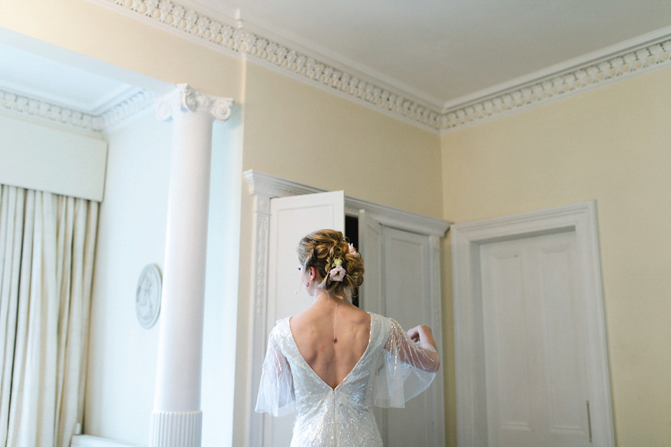 Christina wore an Eliza Jane Howell sequin wedding dress for her mint green country house wedding at Solsgirth House in Scotland. Photography by Chantal Lachance-Gibson.