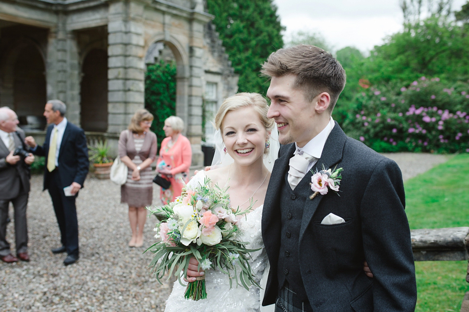 Christina wore an Eliza Jane Howell sequin wedding dress for her mint green country house wedding at Solsgirth House in Scotland. Photography by Chantal Lachance-Gibson.