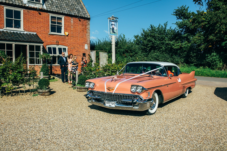 Bride Sam wore a Maggie Sottero gown for her romantic Suffolk country pub wedding. Photography by Emily Tyler.