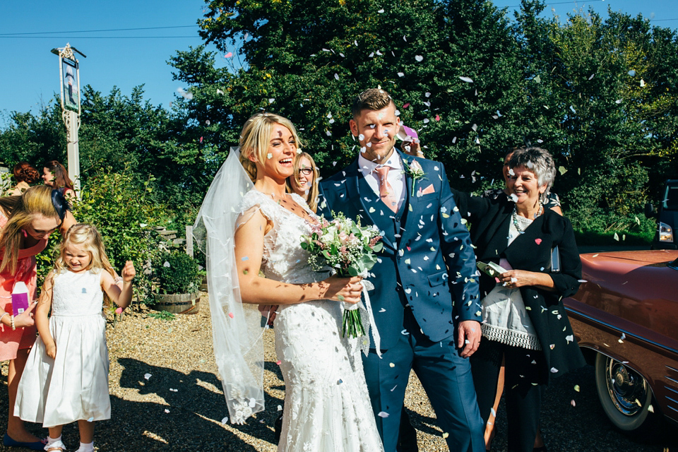 Bride Sam wore a Maggie Sottero gown for her romantic Suffolk country pub wedding. Photography by Emily Tyler.