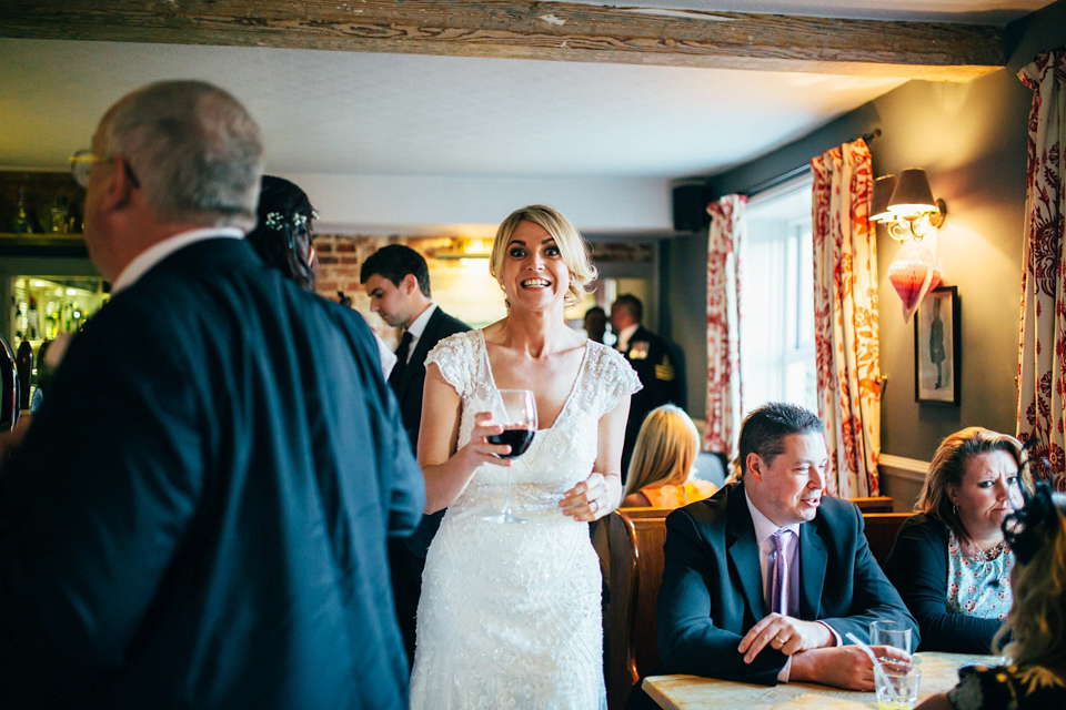 Bride Sam wore a Maggie Sottero gown for her romantic Suffolk country pub wedding. Photography by Emily Tyler.