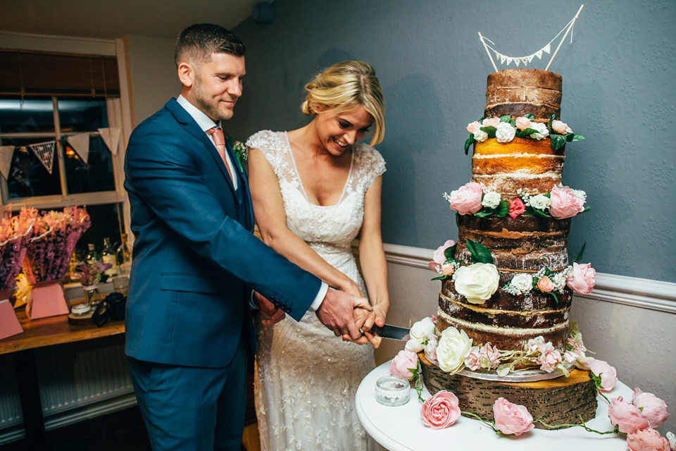 Bride Sam wore a Maggie Sottero gown for her romantic Suffolk country pub wedding. Photography by Emily Tyler.