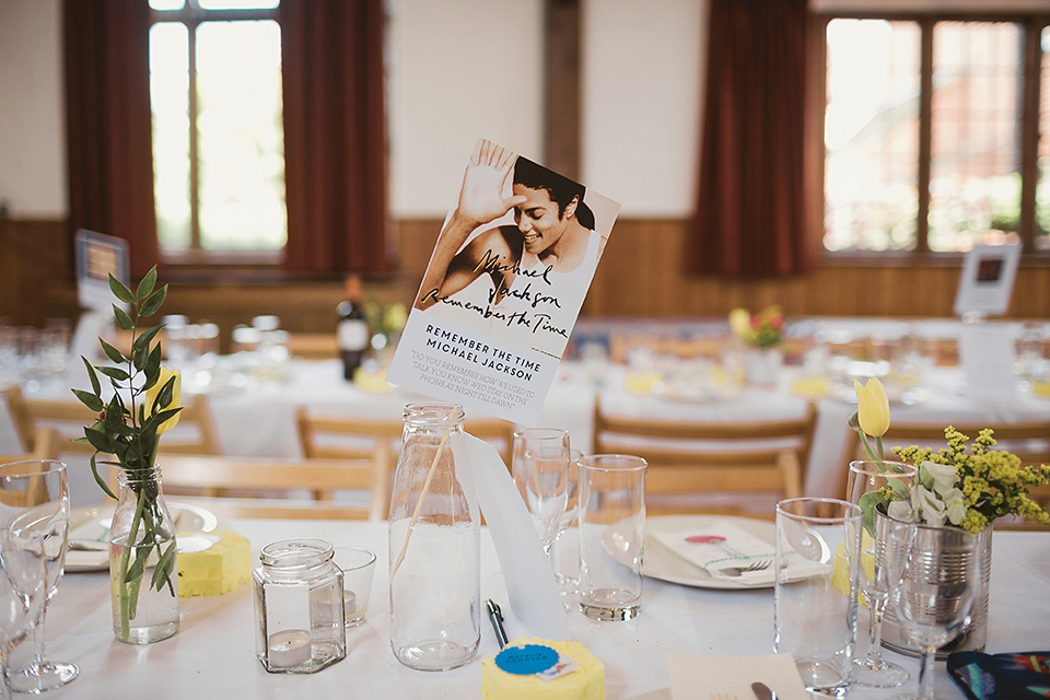 Bride Kate wears a Grace Loves Lace gown for her colourful and Fiesta inspired village hall wedding. Photography by Tom Ravenshear.