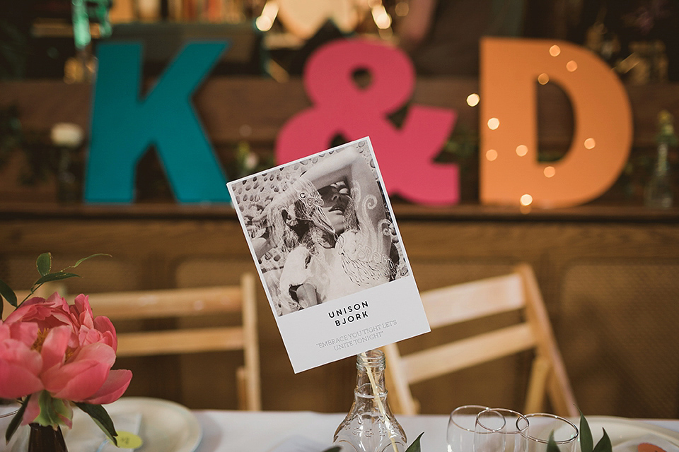 Bride Kate wears a Grace Loves Lace gown for her colourful and Fiesta inspired village hall wedding. Photography by Tom Ravenshear.