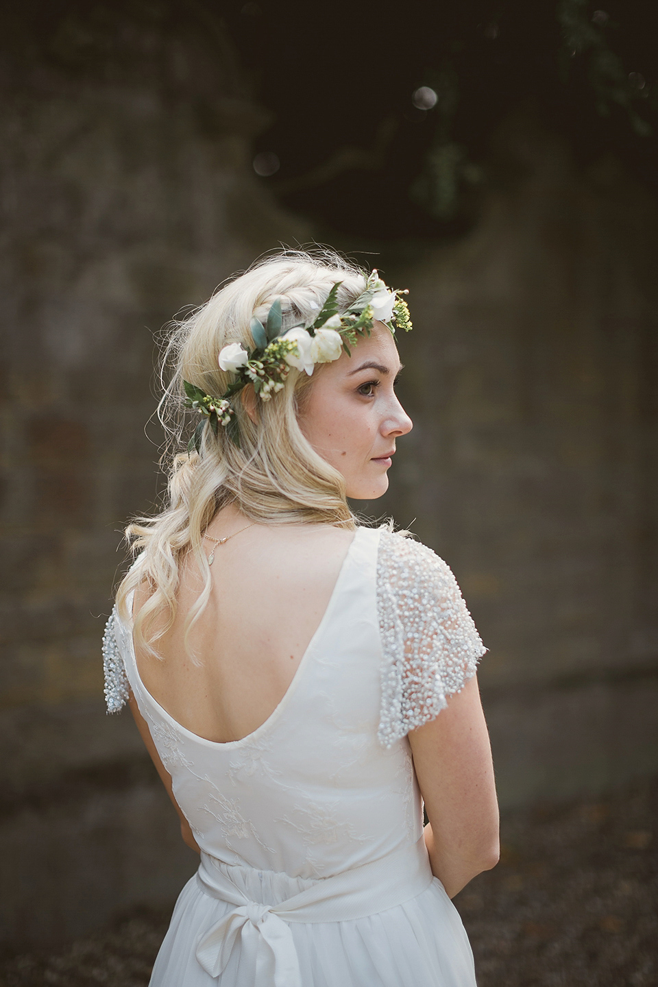 Bride Kate wears a Grace Loves Lace gown for her colourful and Fiesta inspired village hall wedding. Photography by Tom Ravenshear.