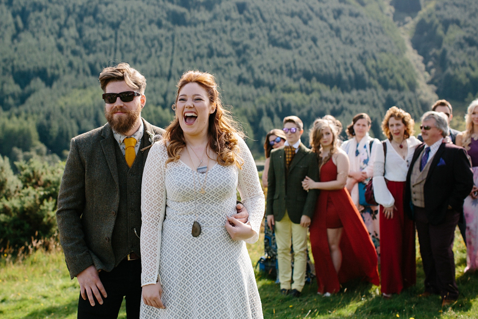 Bride India wears a 1970's inspired gown by Rowanjoy for her Icelandic inspired bohemian and free spirited wedding at Monachyle Mhor in Scotland. Photography by Caro Weiss. Bride India wears a 1970's inspired gown by Rowanjoy for her Icelandic inspired bohemian and free spirited wedding at Monachyle Mhor in Scotland. Photography by Caro Weiss.