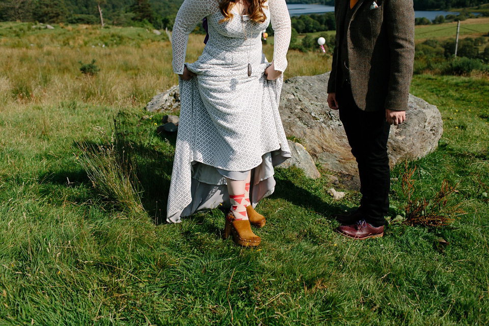 Bride India wears a 1970's inspired gown by Rowanjoy for her Icelandic inspired bohemian and free spirited wedding at Monachyle Mhor in Scotland. Photography by Caro Weiss. Bride India wears a 1970's inspired gown by Rowanjoy for her Icelandic inspired bohemian and free spirited wedding at Monachyle Mhor in Scotland. Photography by Caro Weiss.