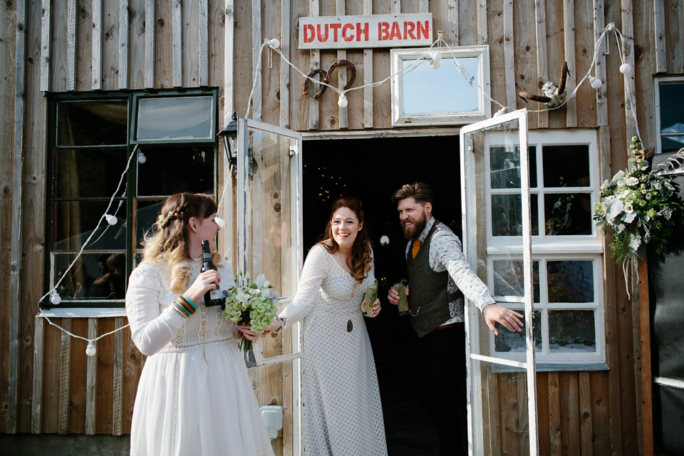 Bride India wears a 1970's inspired gown by Rowanjoy for her Icelandic inspired bohemian and free spirited wedding at Monachyle Mhor in Scotland. Photography by Caro Weiss. Bride India wears a 1970's inspired gown by Rowanjoy for her Icelandic inspired bohemian and free spirited wedding at Monachyle Mhor in Scotland. Photography by Caro Weiss.