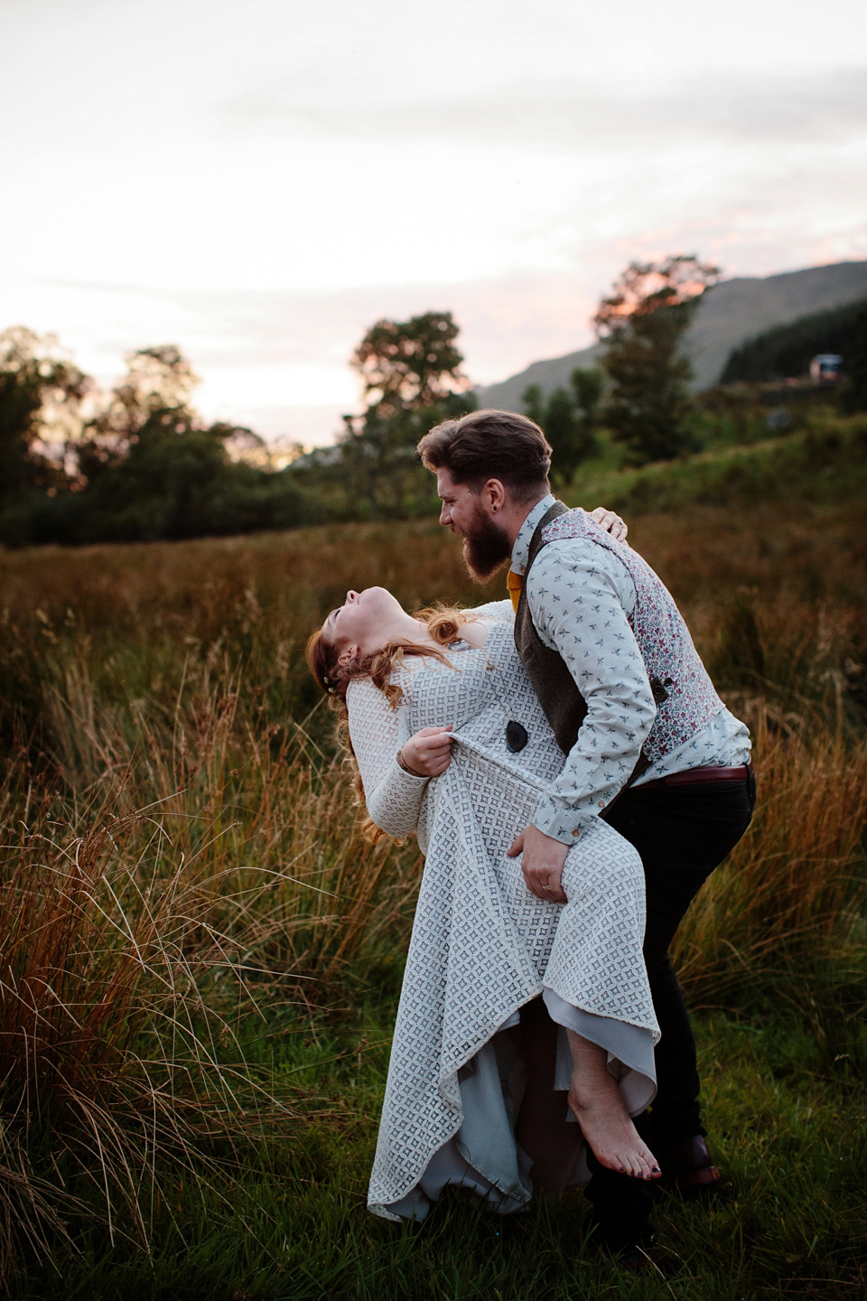 Bride India wears a 1970's inspired gown by Rowanjoy for her Icelandic inspired bohemian and free spirited wedding at Monachyle Mhor in Scotland. Photography by Caro Weiss. Bride India wears a 1970's inspired gown by Rowanjoy for her Icelandic inspired bohemian and free spirited wedding at Monachyle Mhor in Scotland. Photography by Caro Weiss.