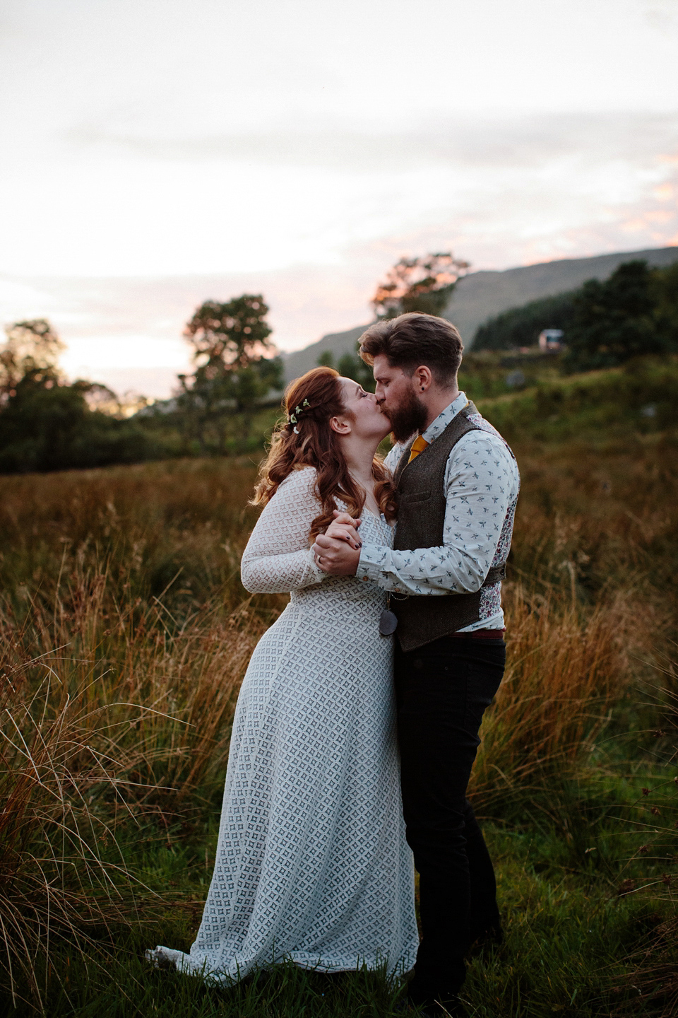 Bride India wears a 1970's inspired gown by Rowanjoy for her Icelandic inspired bohemian and free spirited wedding at Monachyle Mhor in Scotland. Photography by Caro Weiss. Bride India wears a 1970's inspired gown by Rowanjoy for her Icelandic inspired bohemian and free spirited wedding at Monachyle Mhor in Scotland. Photography by Caro Weiss.
