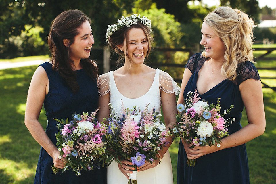 Bride Helen wears a Monsoon wedding dress for her quirky, cloud inspired English garden party wedding. Photography by Red on Blonde.