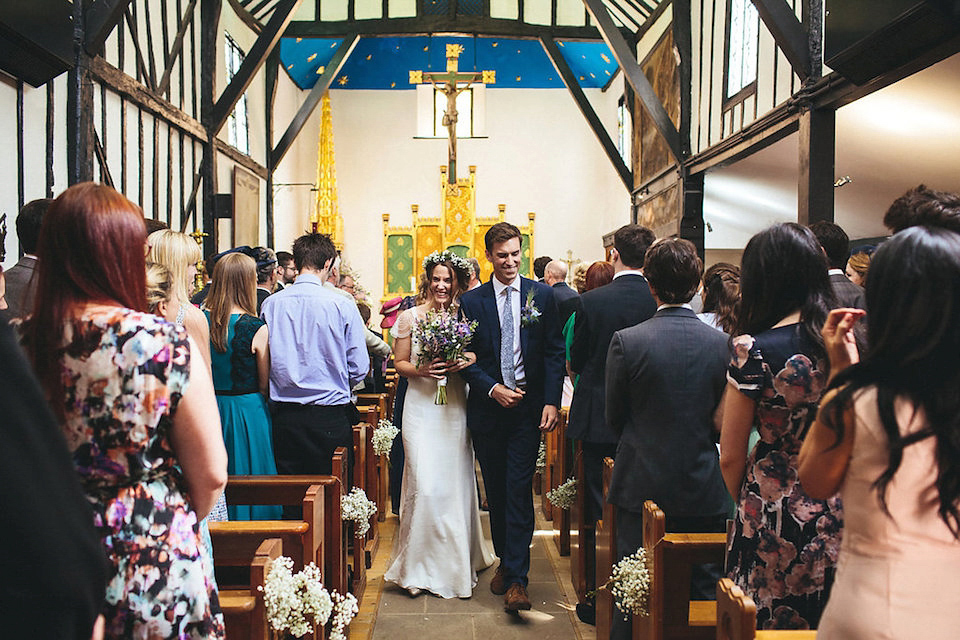 Bride Helen wears a Monsoon wedding dress for her quirky, cloud inspired English garden party wedding. Photography by Red on Blonde.