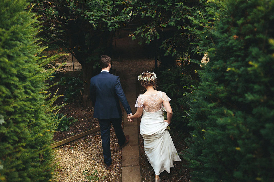 Bride Helen wears a Monsoon wedding dress for her quirky, cloud inspired English garden party wedding. Photography by Red on Blonde.