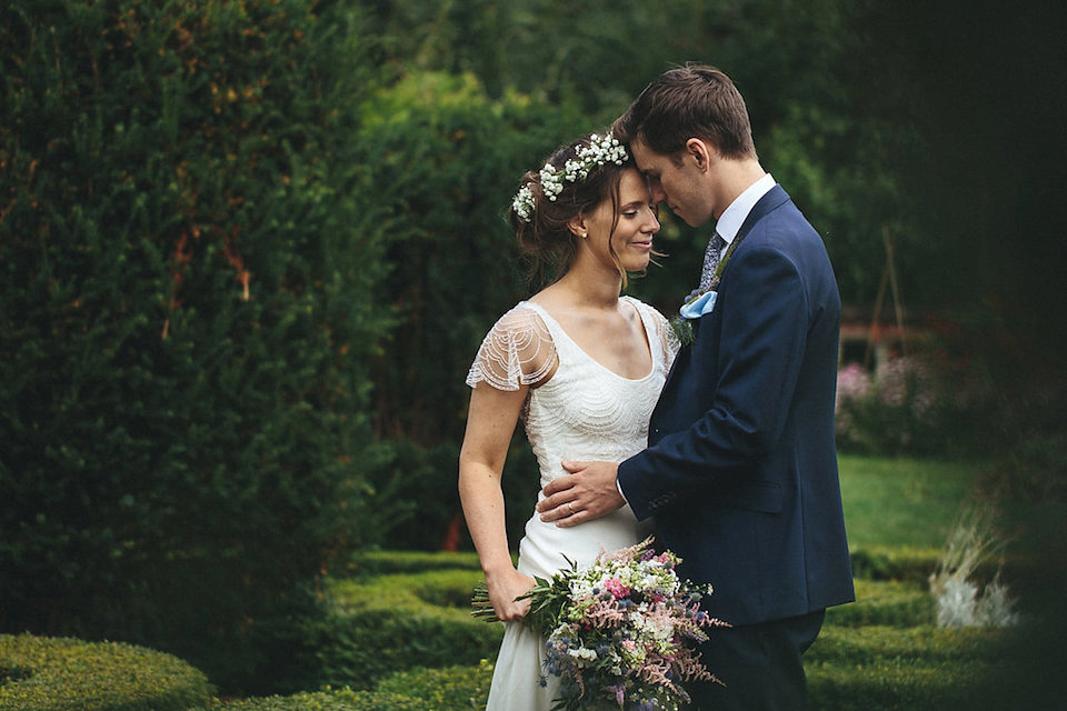 Bride Helen wears a Monsoon wedding dress for her quirky, cloud inspired English garden party wedding. Photography by Red on Blonde.