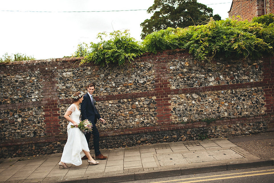 Bride Helen wears a Monsoon wedding dress for her quirky, cloud inspired English garden party wedding. Photography by Red on Blonde.