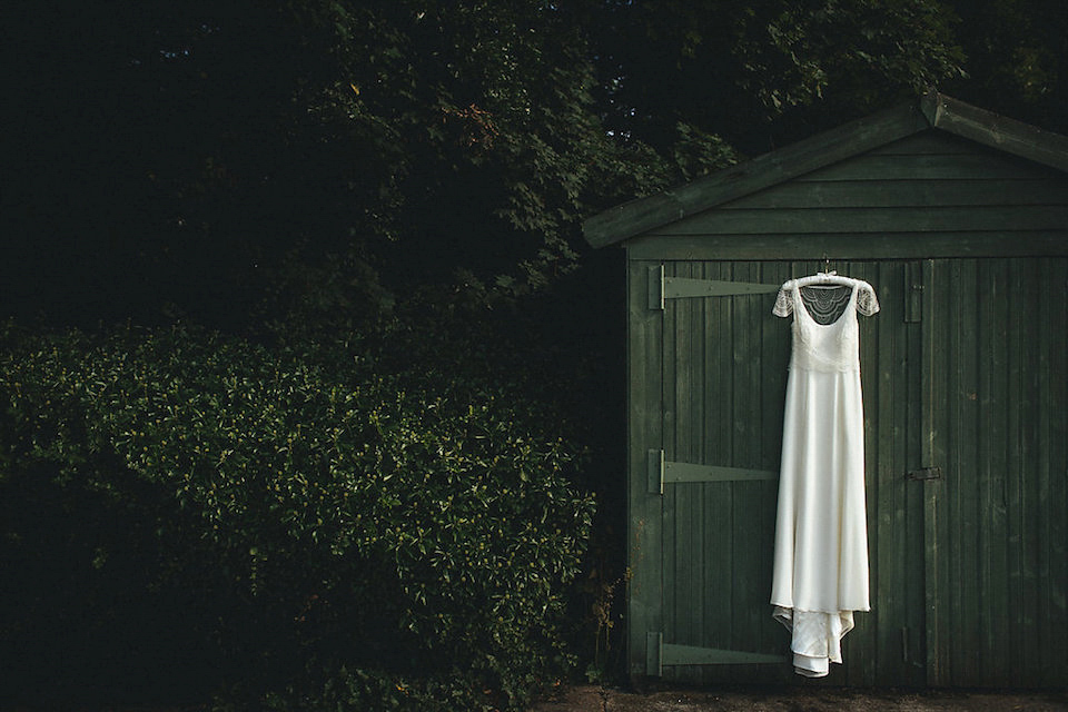 Bride Helen wears a Monsoon wedding dress for her quirky, cloud inspired English garden party wedding. Photography by Red on Blonde.