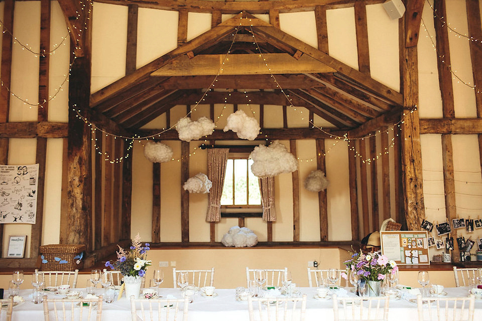 Bride Helen wears a Monsoon wedding dress for her quirky, cloud inspired English garden party wedding. Photography by Red on Blonde.