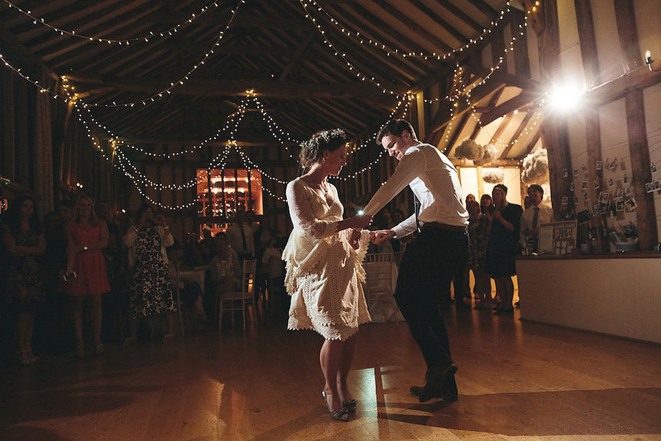 Bride Helen wears a Monsoon wedding dress for her quirky, cloud inspired English garden party wedding. Photography by Red on Blonde.