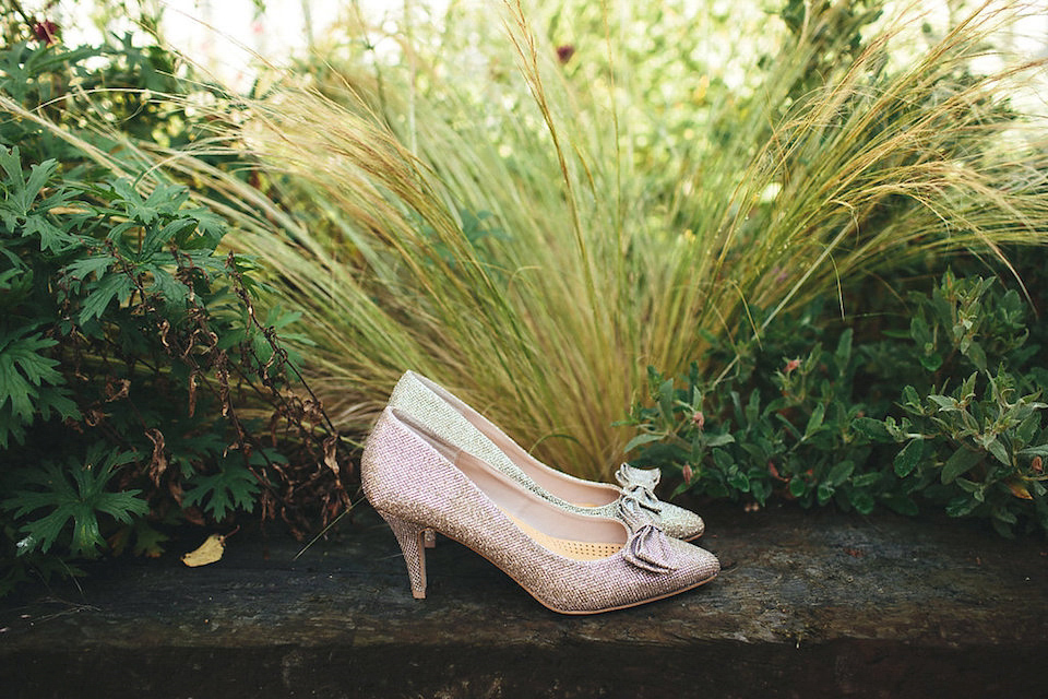 Bride Helen wears a Monsoon wedding dress for her quirky, cloud inspired English garden party wedding. Photography by Red on Blonde.