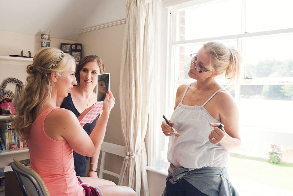 Bride Rosanna wore a Jesus Peiro gown from Miss Bush Bridal in Surrey for her glamorous and romantic English country garden wedding. Photography by Juliet McKee.