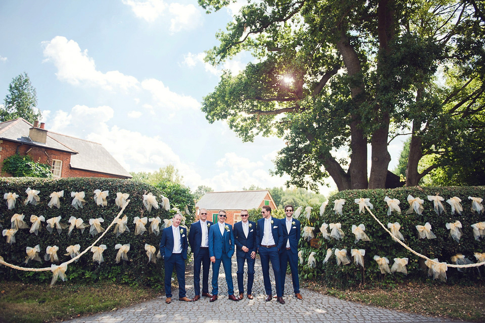 Bride Rosanna wore a Jesus Peiro gown from Miss Bush Bridal in Surrey for her glamorous and romantic English country garden wedding. Photography by Juliet McKee.