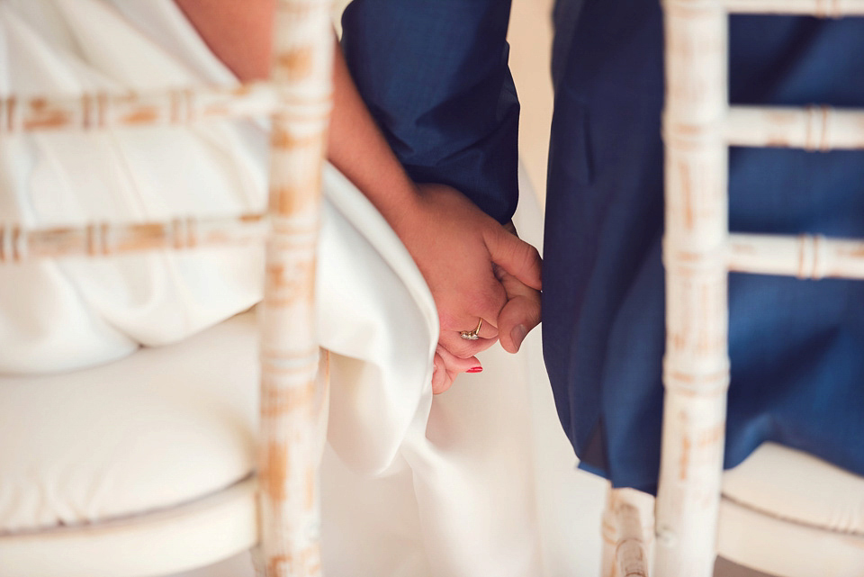 Bride Rosanna wore a Jesus Peiro gown from Miss Bush Bridal in Surrey for her glamorous and romantic English country garden wedding. Photography by Juliet McKee.