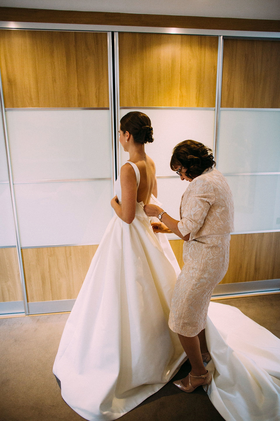 Bride Jo wore a Caroline Castigliano gown with pockets - a purchase from Agapé Bridal Boutique. Photography by The Lawsons.