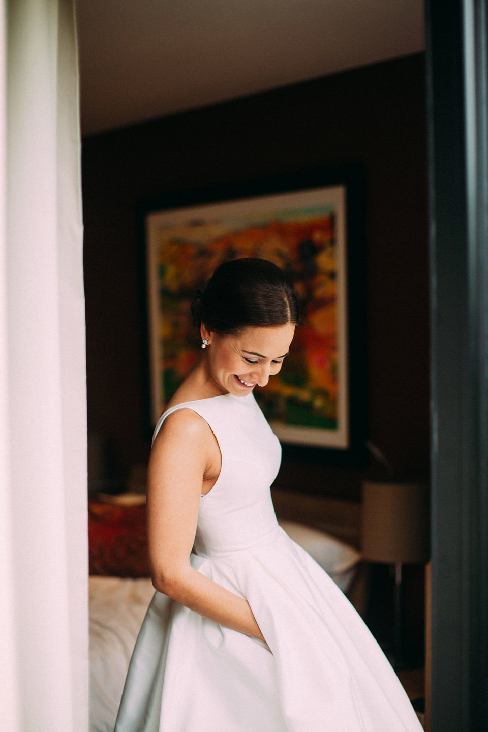 Bride Jo wore a Caroline Castigliano gown with pockets - a purchase from Agapé Bridal Boutique. Photography by The Lawsons.