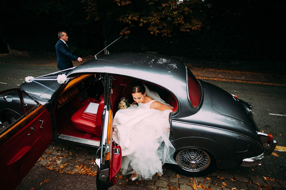 Bride Jo wore a Caroline Castigliano gown with pockets - a purchase from Agapé Bridal Boutique. Photography by The Lawsons.