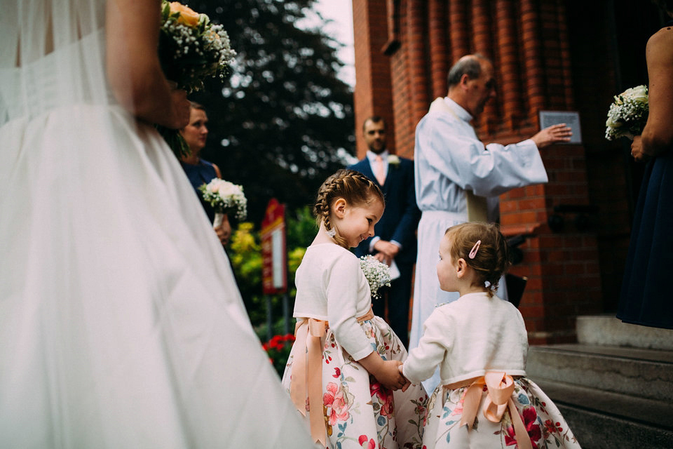 Bride Jo wore a Caroline Castigliano gown with pockets - a purchase from Agapé Bridal Boutique. Photography by The Lawsons.