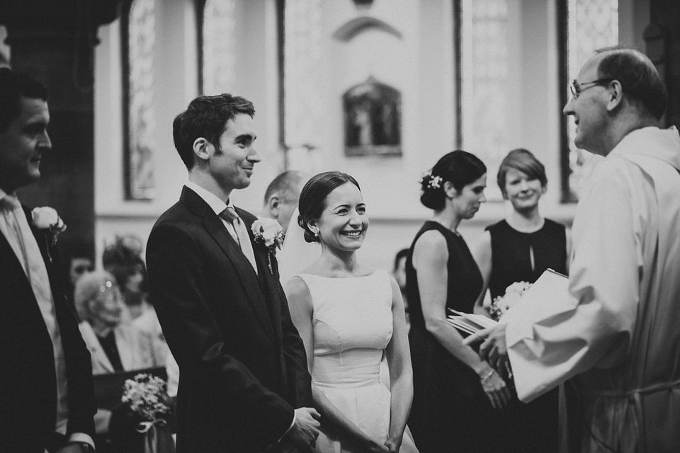 Bride Jo wore a Caroline Castigliano gown with pockets - a purchase from Agapé Bridal Boutique. Photography by The Lawsons.