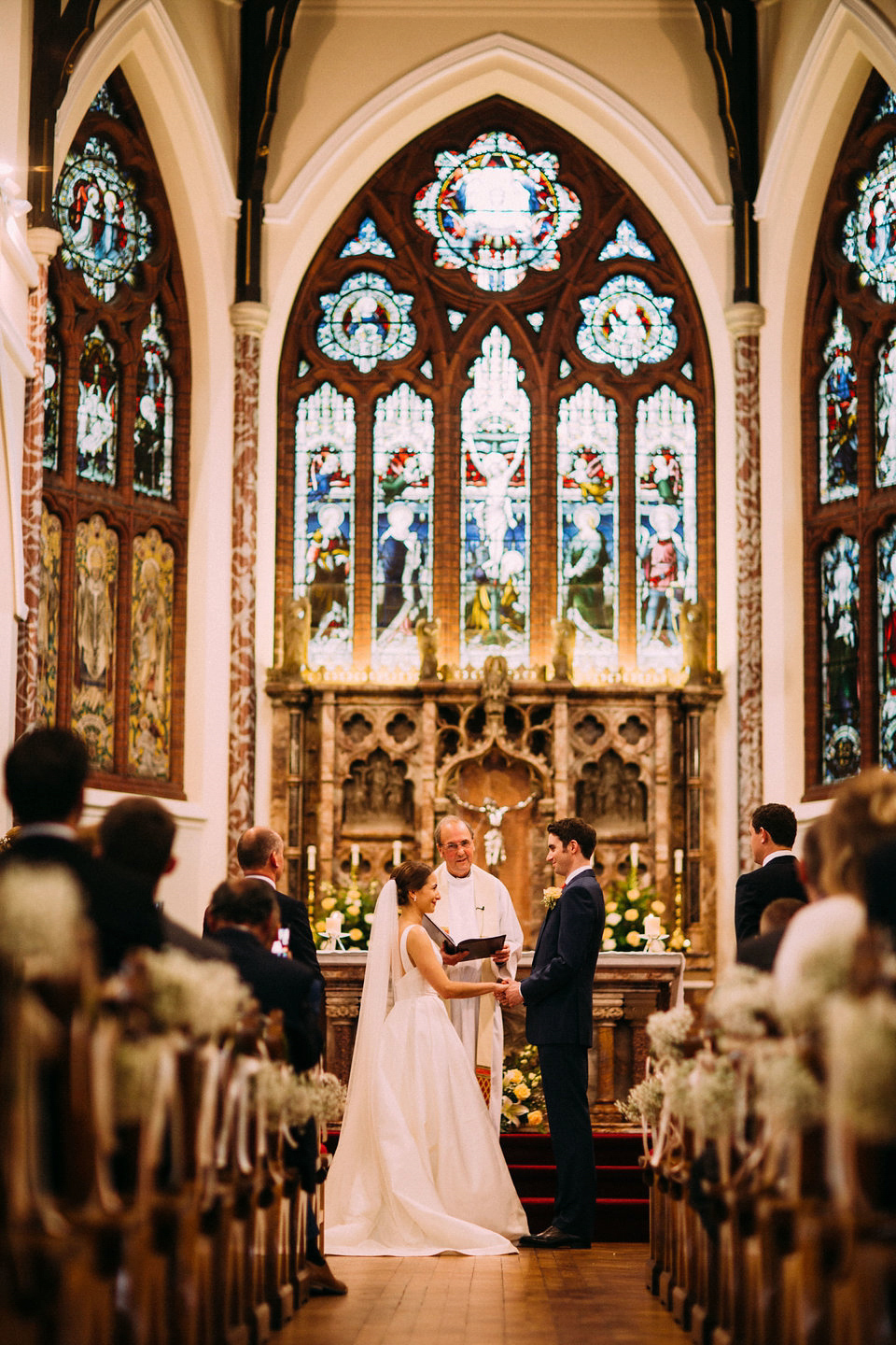 Bride Jo wore a Caroline Castigliano gown with pockets - a purchase from Agapé Bridal Boutique. Photography by The Lawsons.