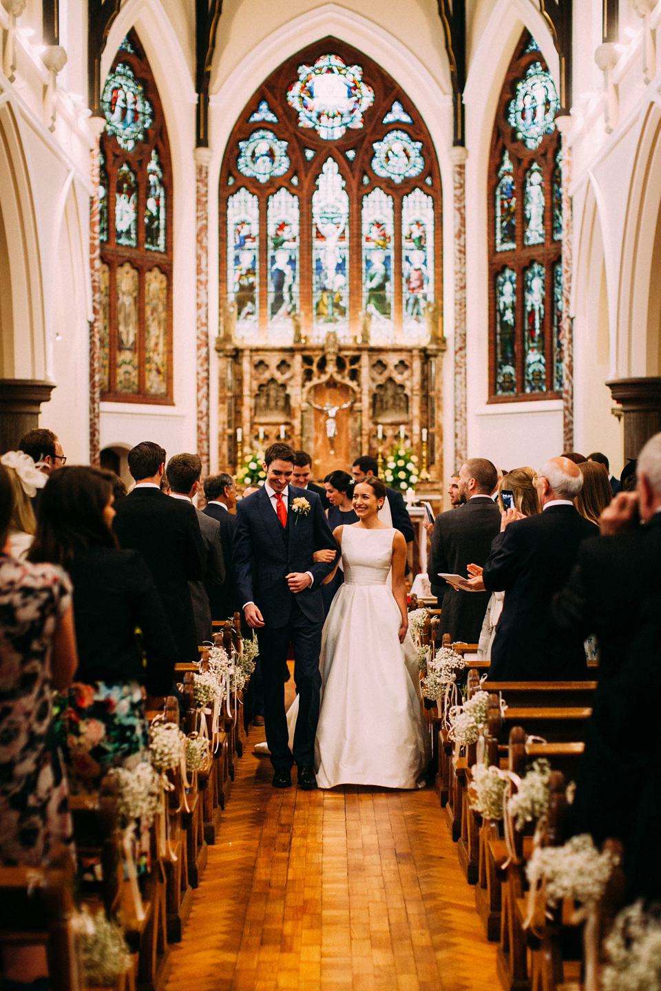 Bride Jo wore a Caroline Castigliano gown with pockets - a purchase from Agapé Bridal Boutique. Photography by The Lawsons.