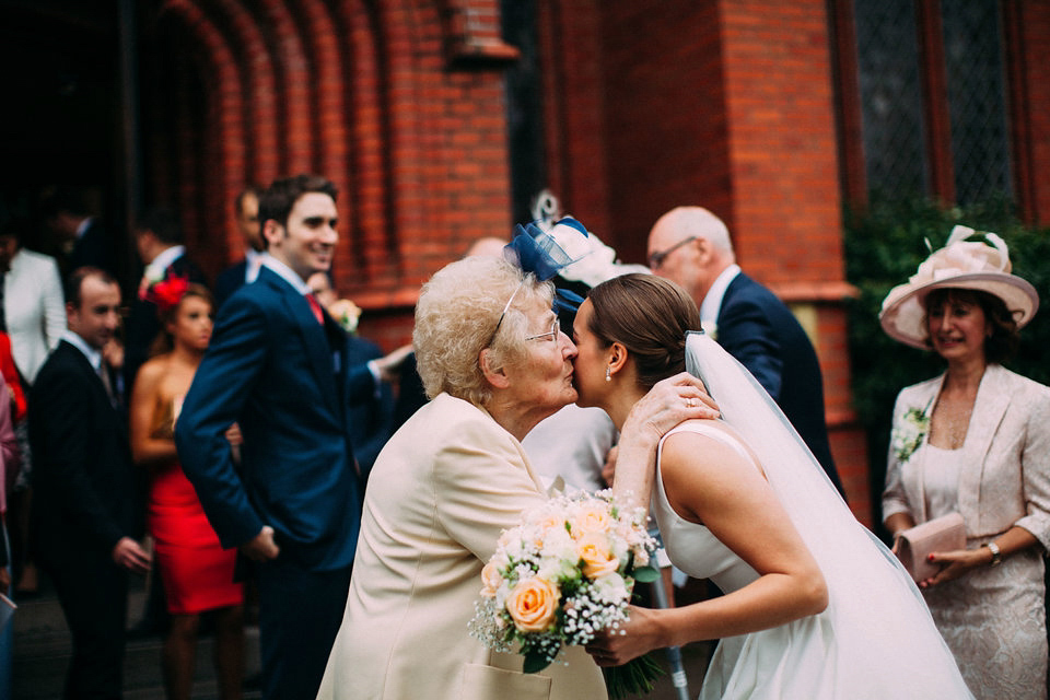 Bride Jo wore a Caroline Castigliano gown with pockets - a purchase from Agapé Bridal Boutique. Photography by The Lawsons.