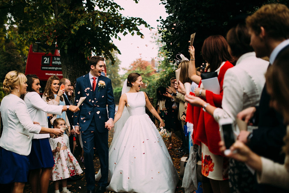 Bride Jo wore a Caroline Castigliano gown with pockets - a purchase from Agapé Bridal Boutique. Photography by The Lawsons.