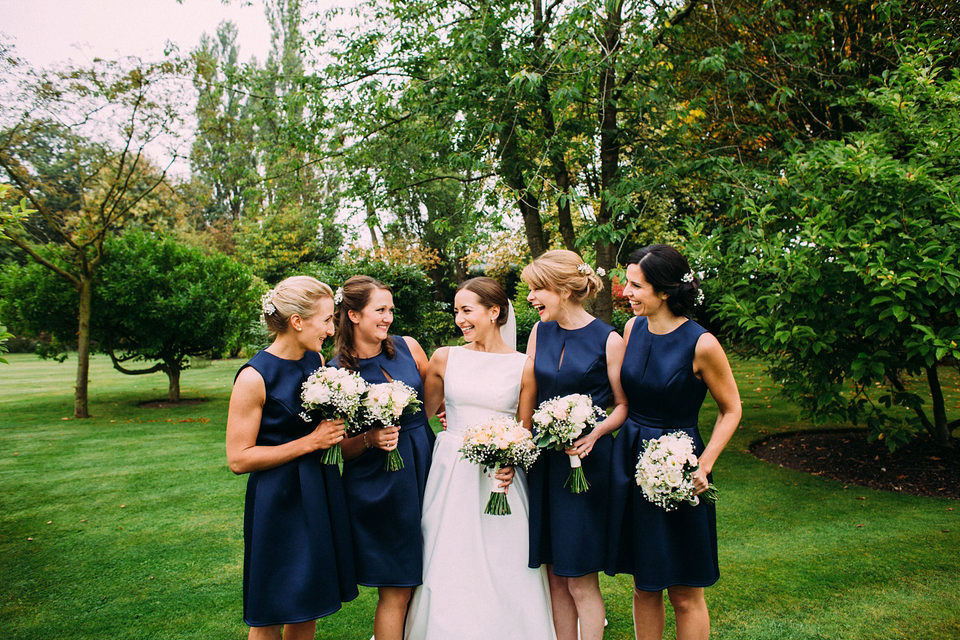 Bride Jo wore a Caroline Castigliano gown with pockets - a purchase from Agapé Bridal Boutique. Photography by The Lawsons.