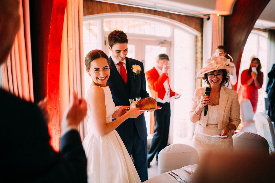 Bride Jo wore a Caroline Castigliano gown with pockets - a purchase from Agapé Bridal Boutique. Photography by The Lawsons.