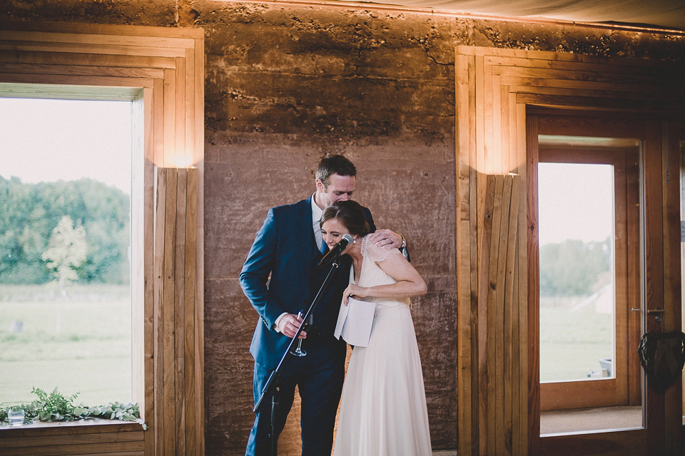 Bride Anna wears Dentelle by Jenny Packham for her Elmore Court wedding. Photography by Eve Dunlop.