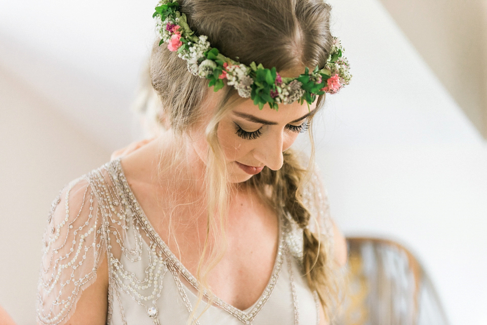 Bride Emma wore Eden by Jenny Packham, a fishtail plait and flowers in her hair for her ourdoor wedding at Baxby Manor. Photography by Sarah Folega.