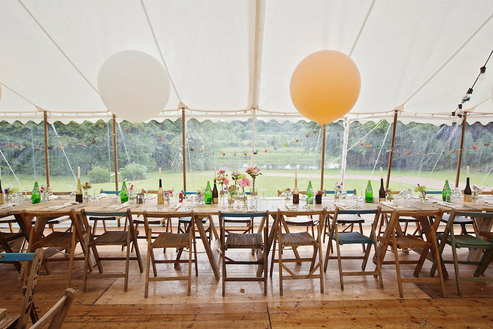 Bride Amy wears a Belle & Bunty Gown for her pretty rustic wedding with 1000 paper cranes. She and her husband David met via the Guardian Soulmates online dating site.