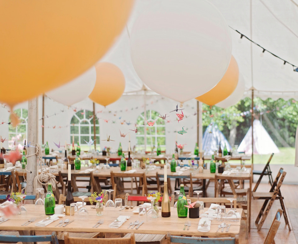 Bride Amy wears a Belle & Bunty Gown for her pretty rustic wedding with 1000 paper cranes. She and her husband David met via the Guardian Soulmates online dating site.