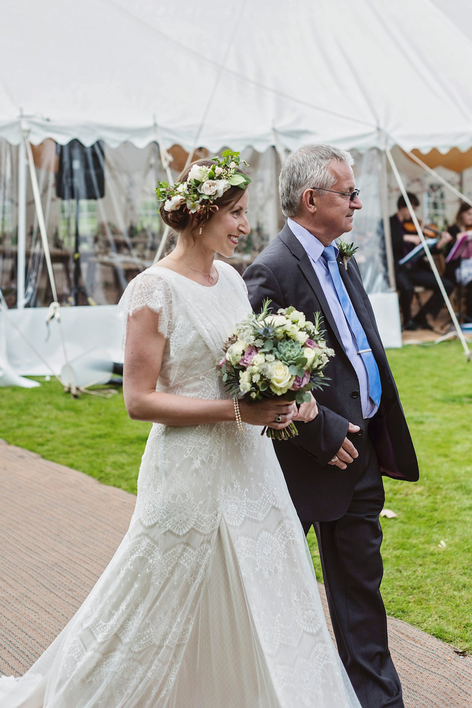 Bride Amy wears a Belle & Bunty Gown for her pretty rustic wedding with 1000 paper cranes. She and her husband David met via the Guardian Soulmates online dating site.