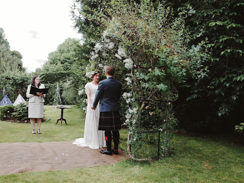 Bride Amy wears a Belle & Bunty Gown for her pretty rustic wedding with 1000 paper cranes. She and her husband David met via the Guardian Soulmates online dating site.