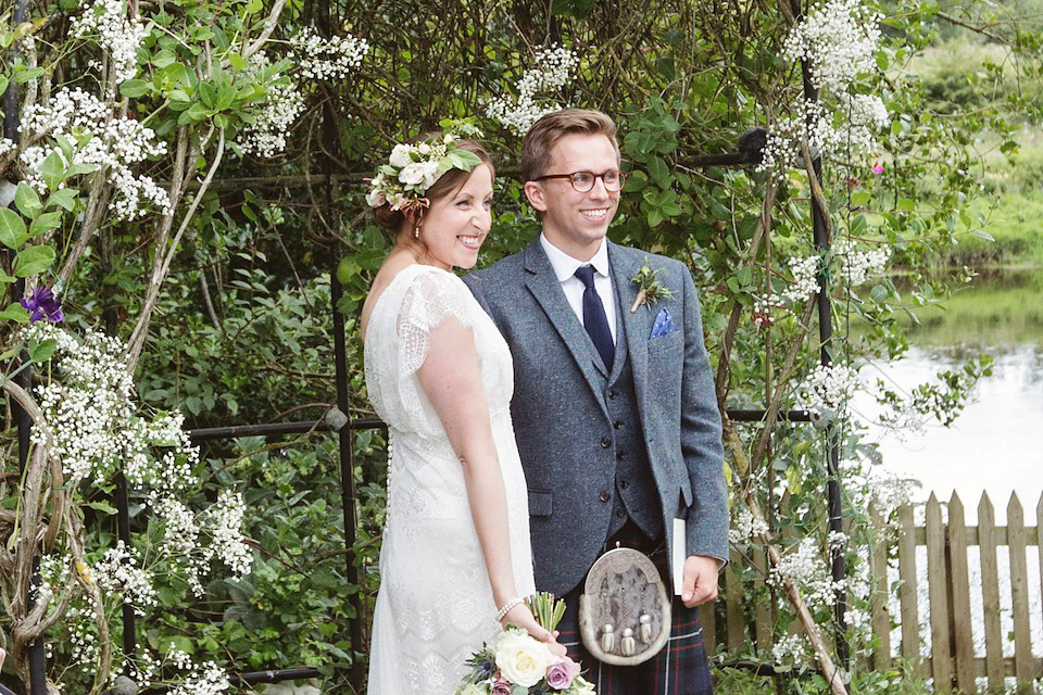 Bride Amy wears a Belle & Bunty Gown for her pretty rustic wedding with 1000 paper cranes. She and her husband David met via the Guardian Soulmates online dating site.