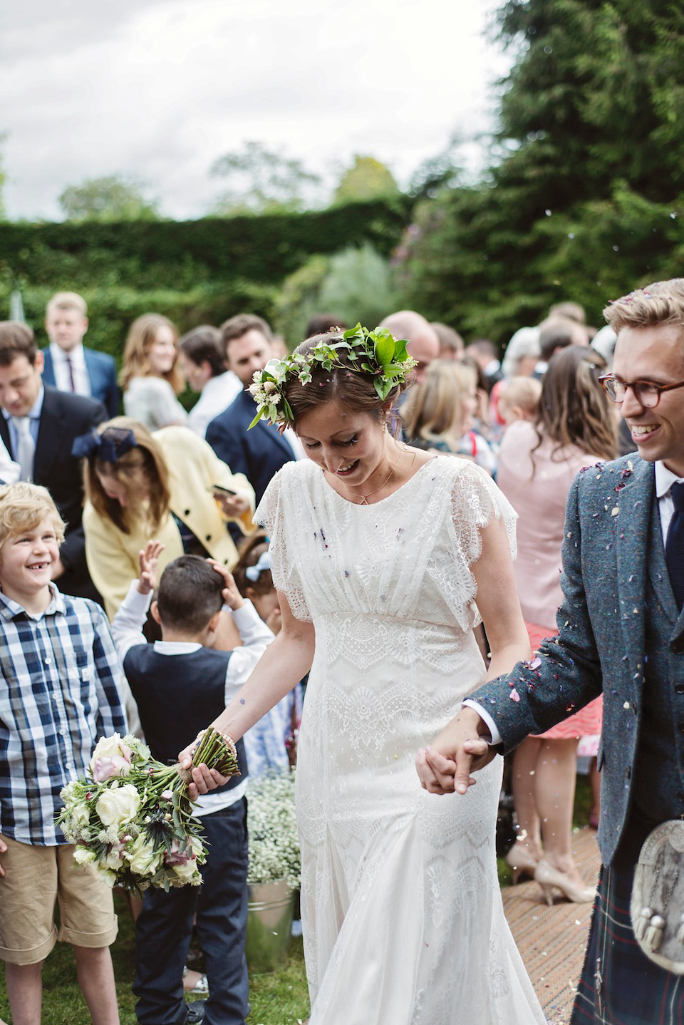 Bride Amy wears a Belle & Bunty Gown for her pretty rustic wedding with 1000 paper cranes. She and her husband David met via the Guardian Soulmates online dating site.