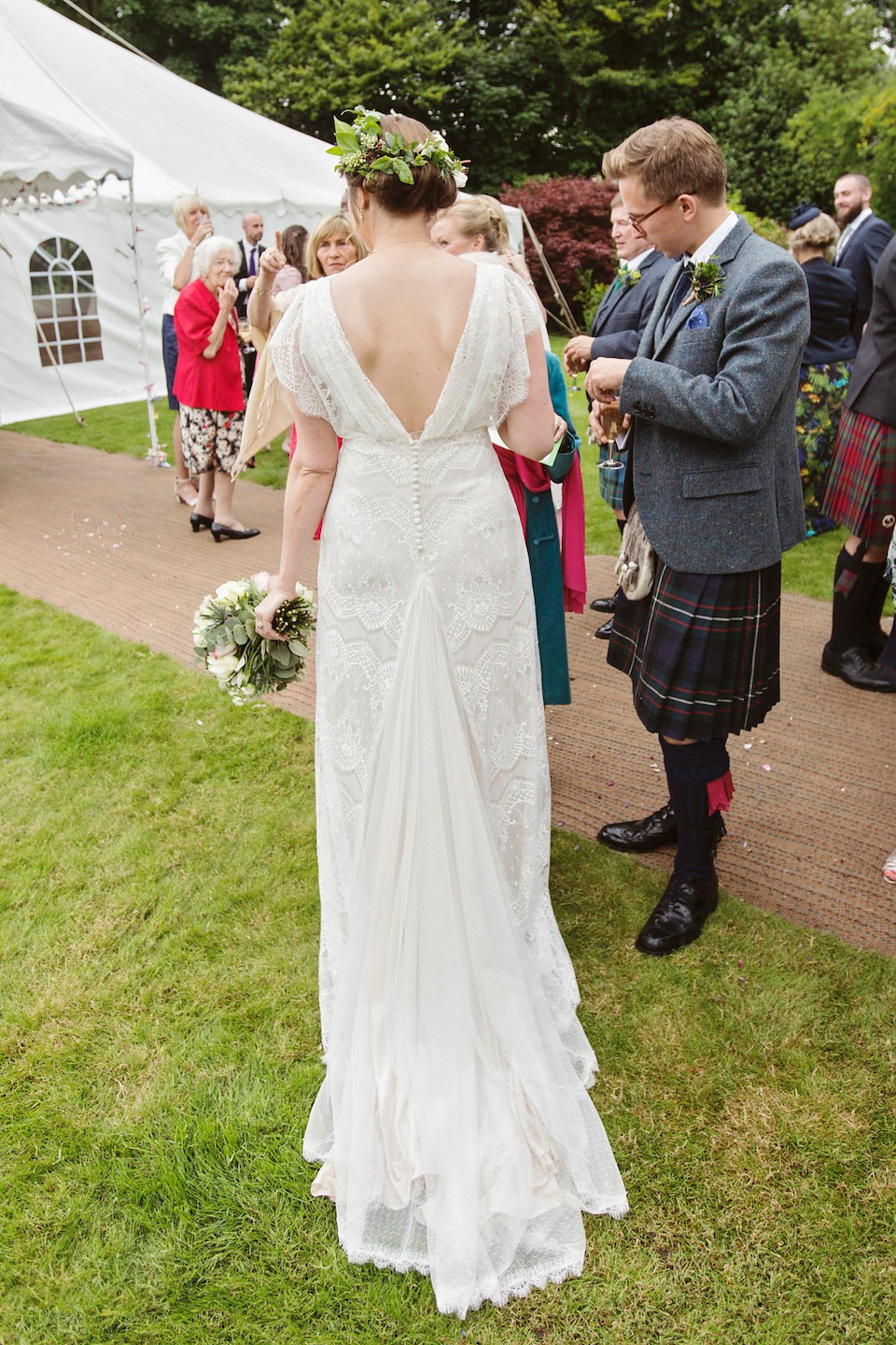 Bride Amy wears a Belle & Bunty Gown for her pretty rustic wedding with 1000 paper cranes. She and her husband David met via the Guardian Soulmates online dating site.