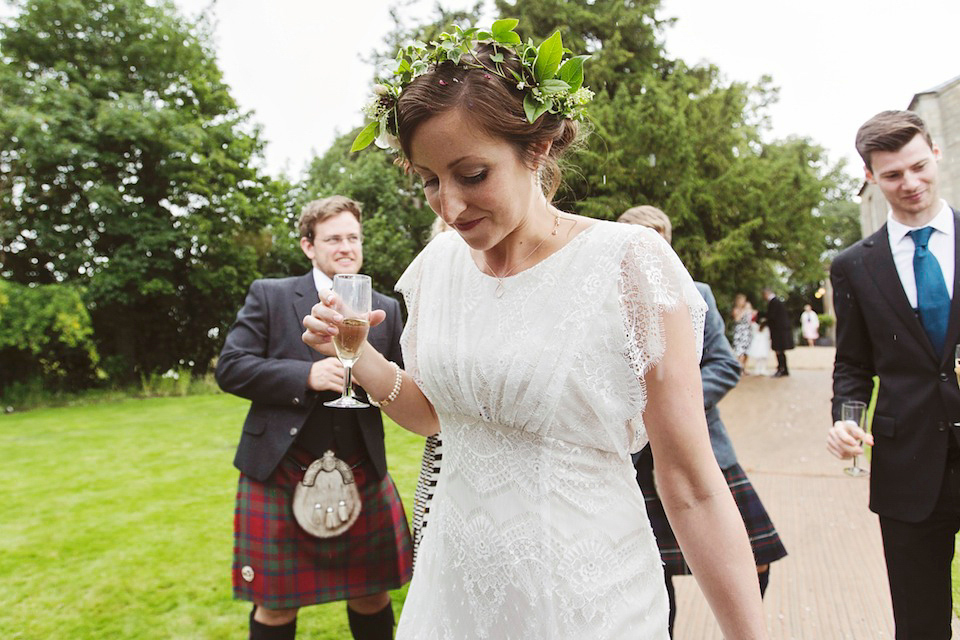 Bride Amy wears a Belle & Bunty Gown for her pretty rustic wedding with 1000 paper cranes. She and her husband David met via the Guardian Soulmates online dating site.