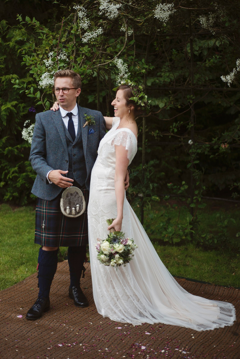 Bride Amy wears a Belle & Bunty Gown for her pretty rustic wedding with 1000 paper cranes. She and her husband David met via the Guardian Soulmates online dating site.