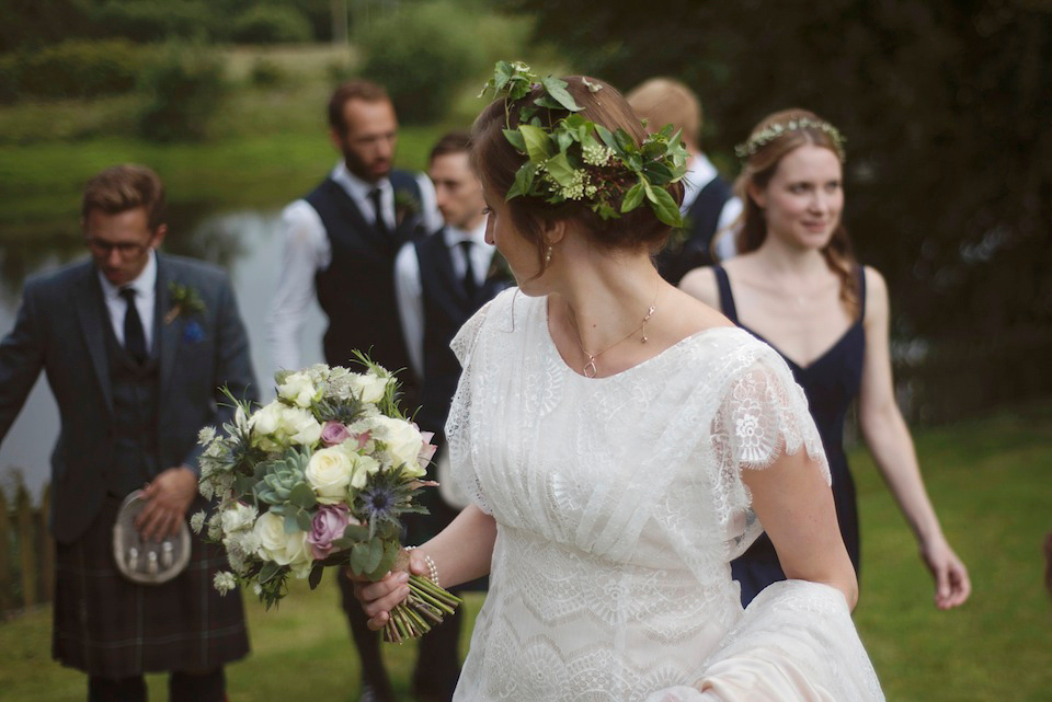 Bride Amy wears a Belle & Bunty Gown for her pretty rustic wedding with 1000 paper cranes. She and her husband David met via the Guardian Soulmates online dating site.