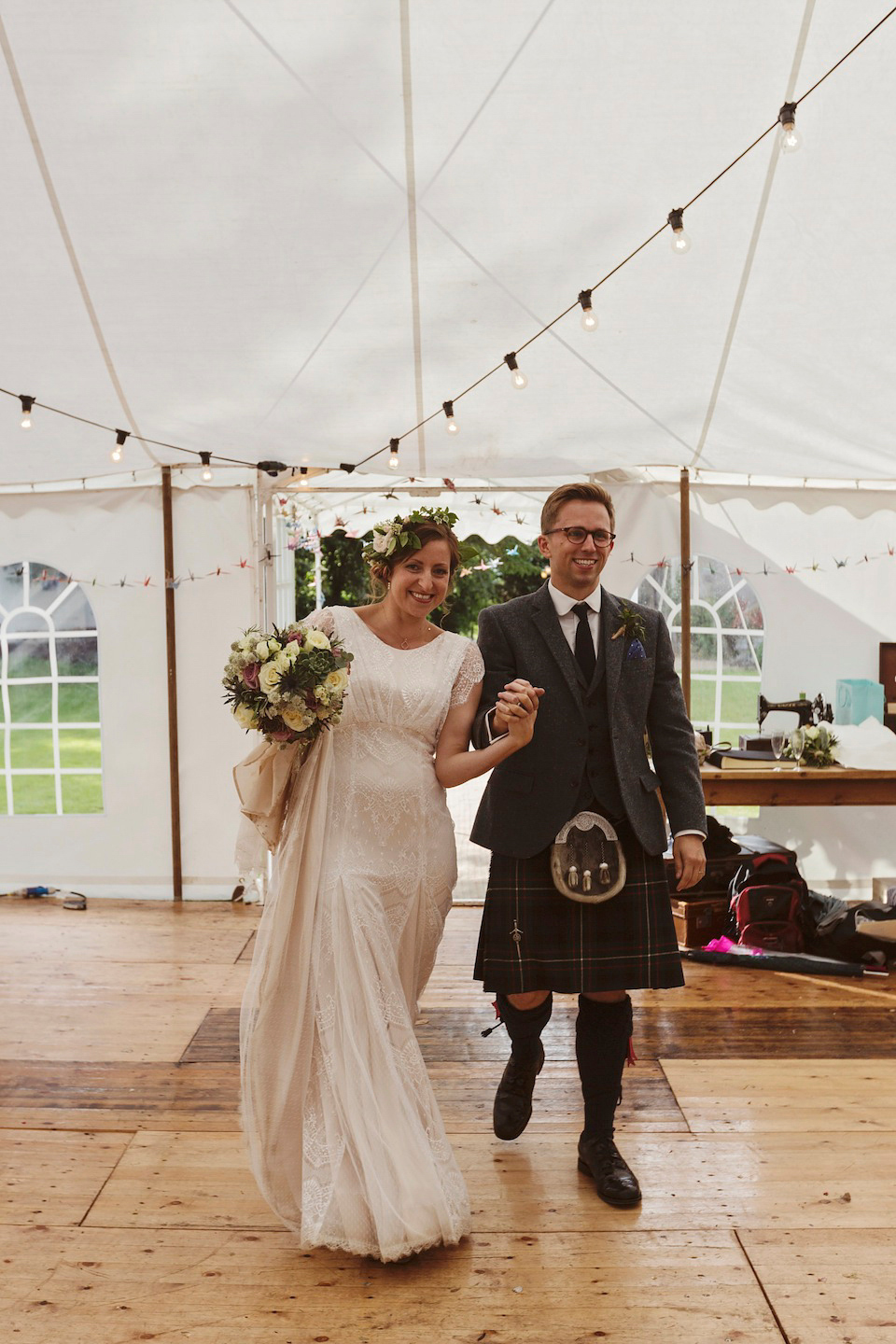 Bride Amy wears a Belle & Bunty Gown for her pretty rustic wedding with 1000 paper cranes. She and her husband David met via the Guardian Soulmates online dating site.